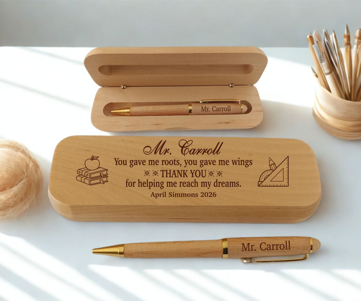 Personalized wooden pen and matching wooden case set on a white surface, with the case engraved with a thank-you message for Mr. Carroll and school-themed illustrations.