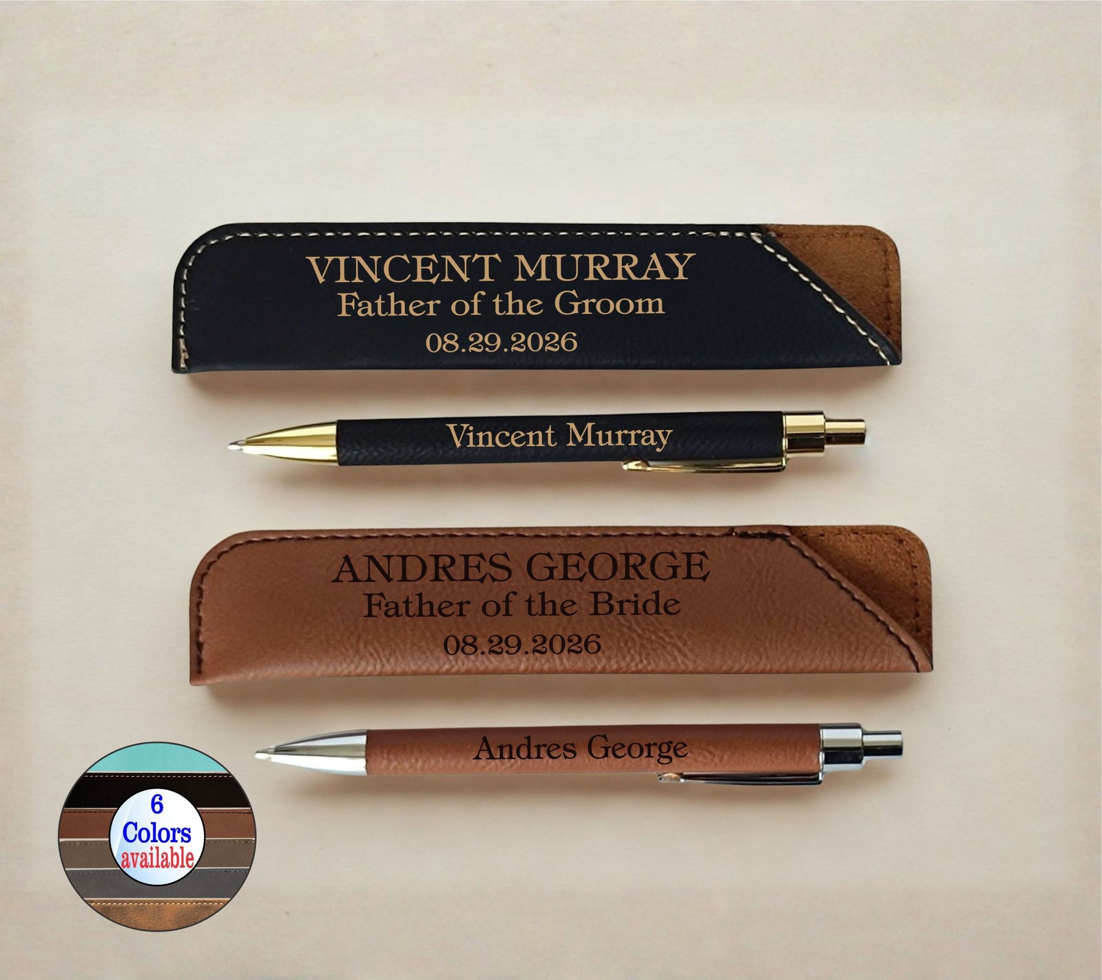 Personalized leather pen sleeves and matching pens on a light beige background. The set includes a black sleeve with gold text, a black pen with gold trim, a brown leather sleeve, and a brown pen with silver and gold trim.