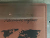 Leather passport holder being laser engraved